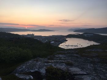 Scenic view of sea against sky at sunset