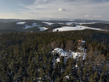 Scenic view of landscape against sky during winter