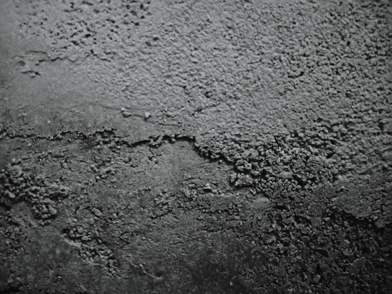 FULL FRAME SHOT OF CRACKED MUD