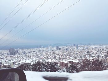 Aerial view of cityscape during winter