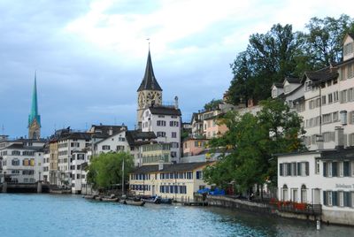 View of buildings against cloudy sky