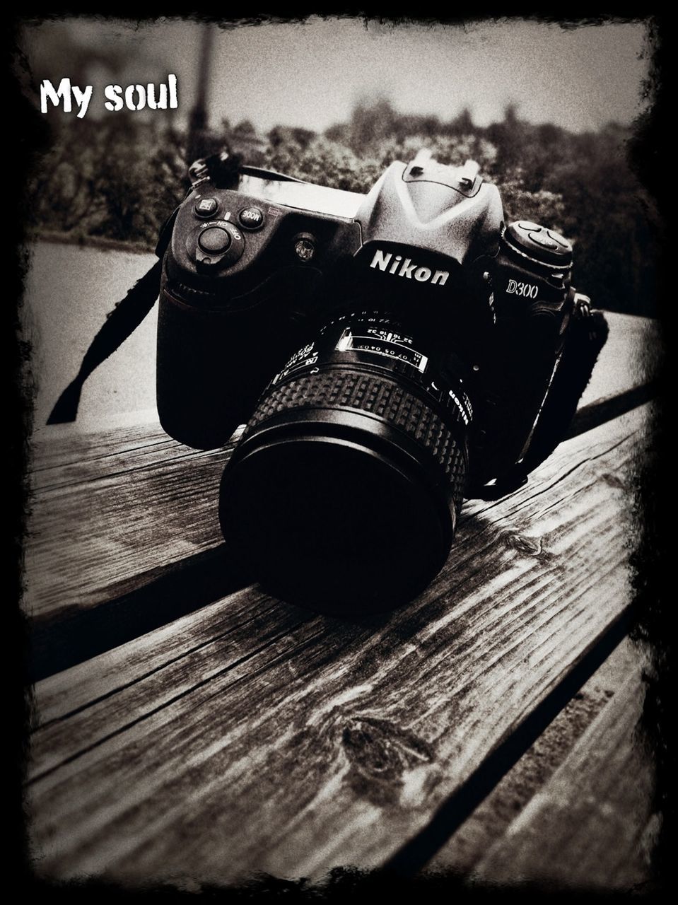 technology, close-up, indoors, table, communication, wood - material, transfer print, still life, auto post production filter, photography themes, retro styled, focus on foreground, selective focus, text, old-fashioned, music, high angle view, metal, camera - photographic equipment, single object