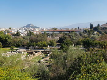 View of cityscape against clear sky