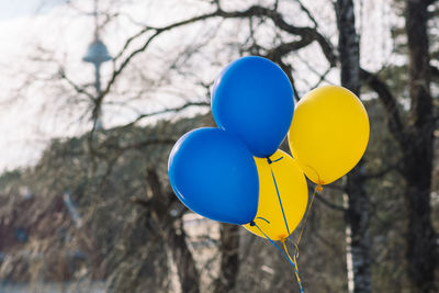 Balloons during a peaceful demonstration against war in support of ukraine with vilnius tv tower