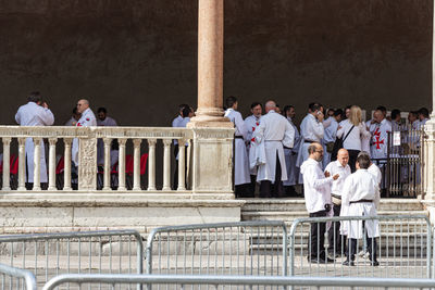 Group of people against the wall