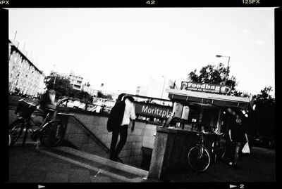 Woman standing in city