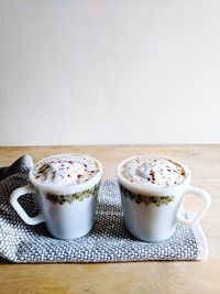 Close-up of coffee cup on table