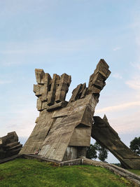 Low angle view of old ruins against sky