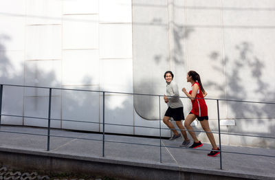 Full length of woman running