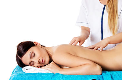 Midsection of woman lying down