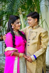 Young couple looking at each other while standing outdoors