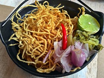 High angle view of noodles in plate on table