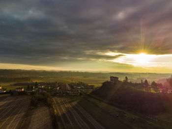 High angle view of buildings against sky during sunset