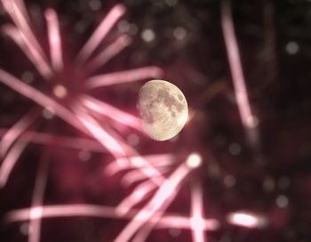 Close-up of illuminated moon at night