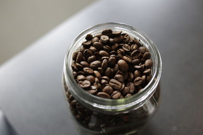 High angle view of coffee beans in container