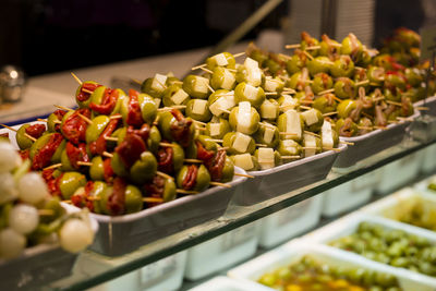 High angle view of olives in trays at store