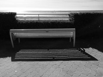 Close-up of seat against sky