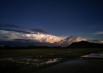 Scenic view of landscape against sky during sunset