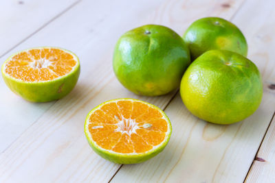 Close-up of green fruits on table