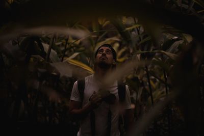 Young man smoking outdoors