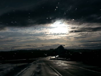 View of road against cloudy sky