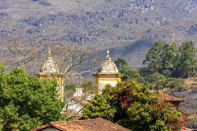 View of temple against building