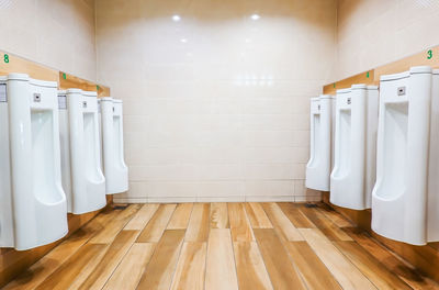 Urinals in public restroom