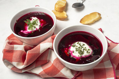 High angle view of soup in bowls on table