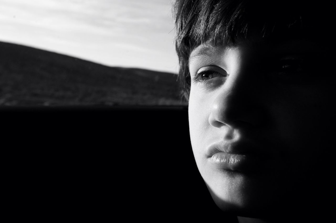 headshot, person, lifestyles, young adult, portrait, close-up, looking at camera, contemplation, human face, leisure activity, focus on foreground, head and shoulders, front view, serious, copy space, young men