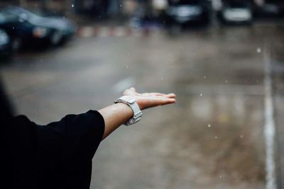 Close-up of hand against blurred background