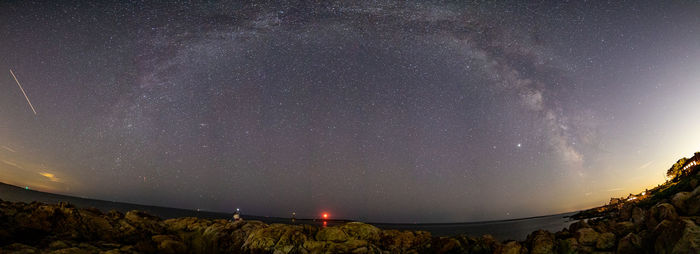 Scenic view of star field against sky at night