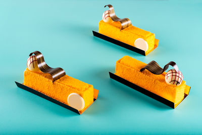 High angle view of toy on table against blue background