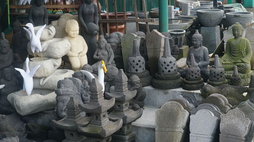 Statues at market stall