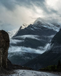 Scenic view of snowcapped mountains against sky