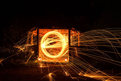 Light trails on fire at night