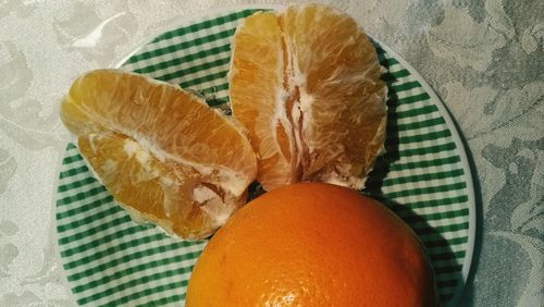 Close-up of orange slices in plate