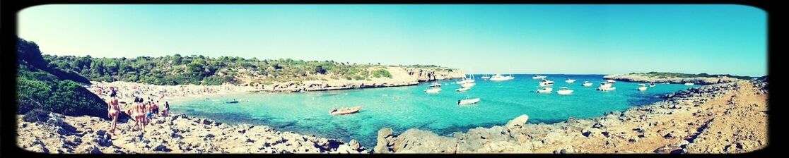 sea, water, transfer print, clear sky, blue, beach, tranquility, tranquil scene, horizon over water, copy space, scenics, auto post production filter, beauty in nature, shore, nature, nautical vessel, sand, panoramic, coastline, high angle view