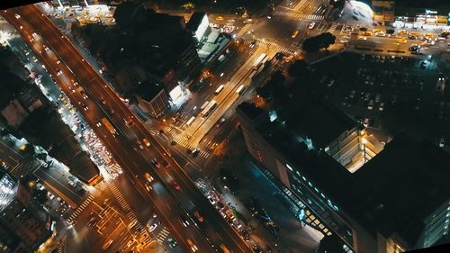 High angle view of illuminated cityscape at night