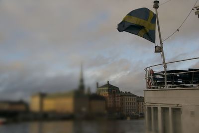 Buildings against cloudy sky