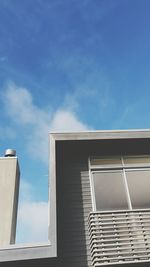 Low angle view of building against blue sky