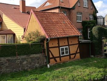 Exterior of old building in field