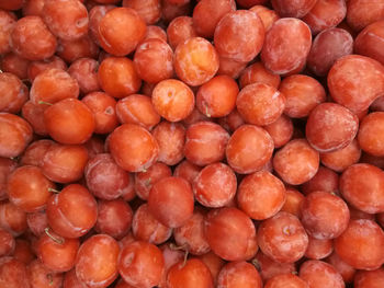 Full frame shot of oranges at market stall