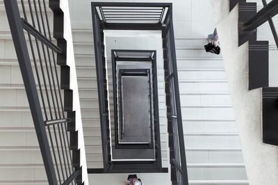 Man standing on staircase