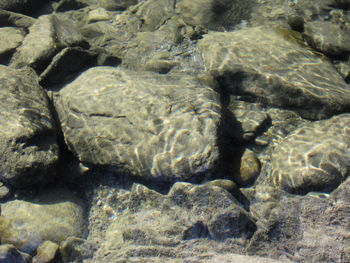 Full frame shot of rocks in sea