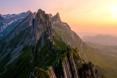 View of rocky mountains against sky