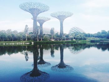 Lake at gardens by the bay against sky