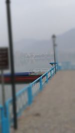 Pier over sea against sky