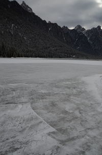 Scenic view of frozen lake against mountain