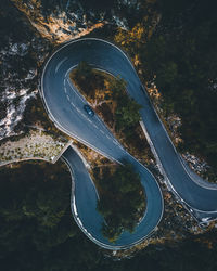 High angle view of highway amidst trees in forest