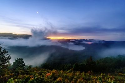 Scenic view of mountains against sky during sunset